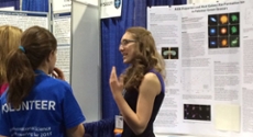 Lia Eggleston explains her research to interest public at the 2015 Intel International Science & Engineering Fair.